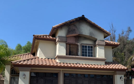 a house partially damaged by fire.