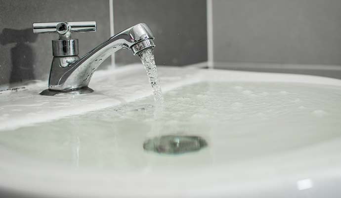 overflowing bathroom sink