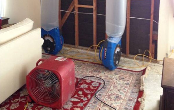 water extraction equipment setup on the floor